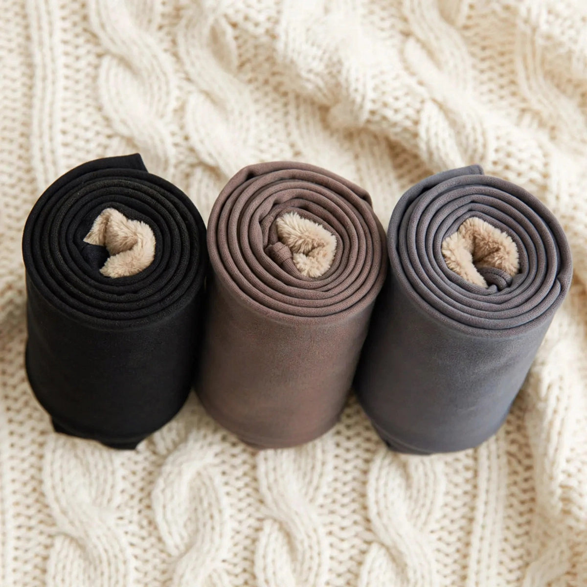 Fleece-lined tights with a sheer look in Black, Coffee and Grey, shown with the beige fleece lining.